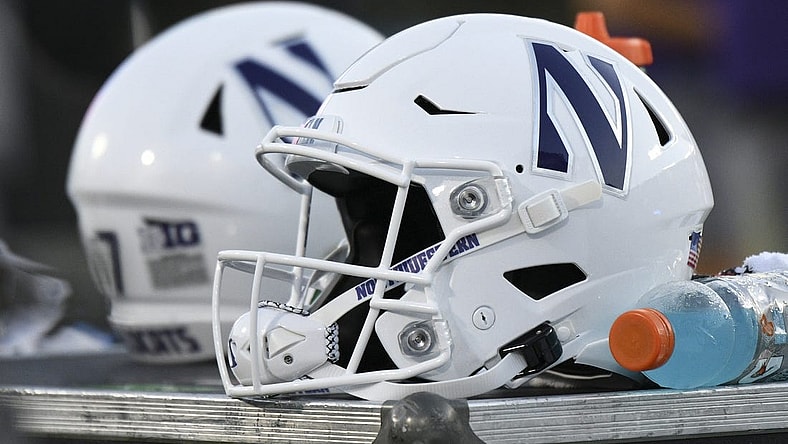 Sep 18, 2021; Durham, North Carolina, USA; A Northwestern Wildcats helmet sits on an equipment chest during the fourth quarter at Wallace Wade Stadium. Mandatory Credit: William Howard-USA TODAY Sports
