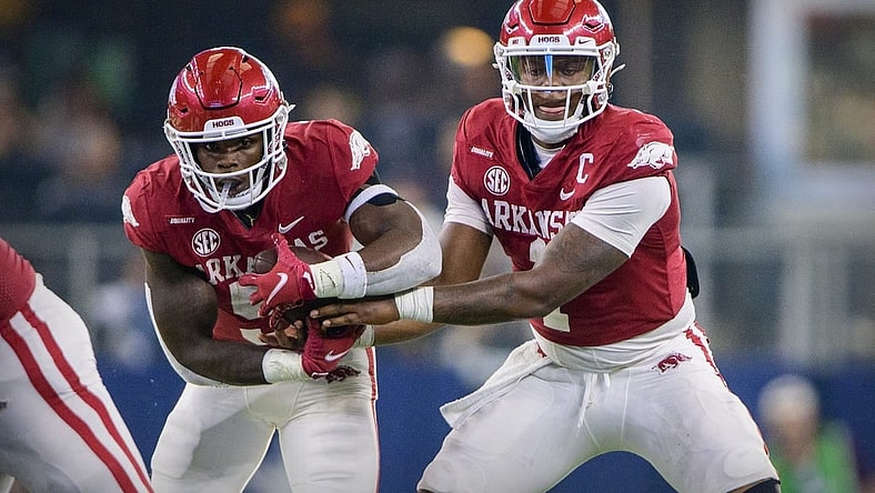 Sep 25, 2021; Arlington, Texas, USA; Arkansas Razorbacks quarterback KJ Jefferson (1) hands off to running back Raheim Sanders (5) during the second half at AT&T Stadium. Mandatory Credit: Jerome Miron-USA TODAY Sports
