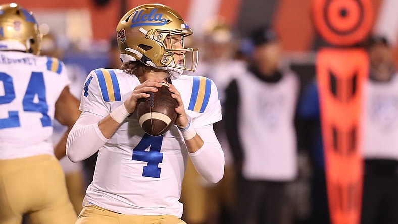 Oct 30, 2021; Salt Lake City, Utah, USA; UCLA Bruins quarterback Ethan Garbers (4) drops back to pass the ball during the first quarter against the Utah Utes at Rice-Eccles Stadium. Mandatory Credit: Rob Gray-USA TODAY Sports