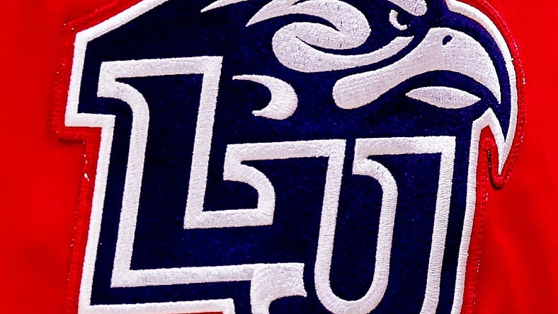 Nov 15, 2021; Baton Rouge, Louisiana, USA;  Liberty Flames view of their logo on their shorts open a time out against  LSU Tigers during the second half at Pete Maravich Assembly Center. Mandatory Credit: Stephen Lew-USA TODAY Sports