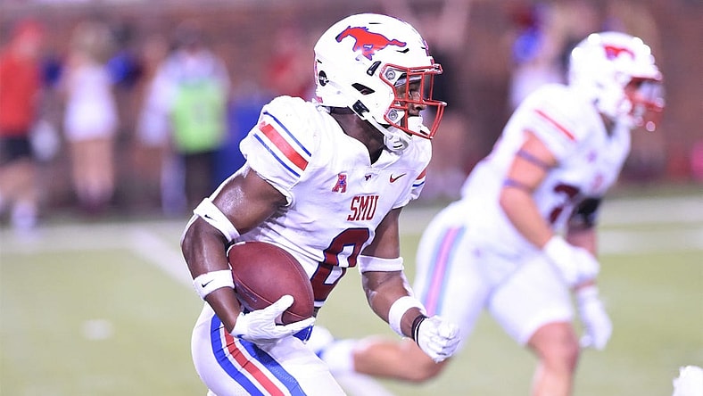 SMU's Bryan Massey (0) returns an interception on the final play of Saturday's game against ACU at Gerald J. Ford Stadium in Dallas on Sept. 4, 2021. The Mustangs won 56-9.

Hof 8420 2