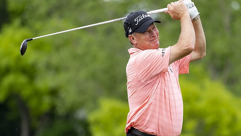 May 26, 2022; Benton Harbor, Michigan, USA; Woody Austin hits his tee shot on the eighth hole during the first round of the 2022 KitchenAid Senior PGA Championship at Harbor Shores. Mandatory Credit: Raj Mehta-USA TODAY Sports