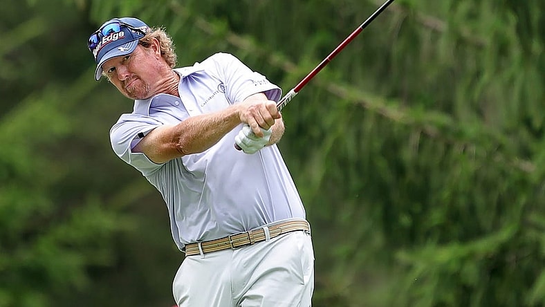 Tim Petrovic sends his ball down the fairway on the 13th hole during second round of the Bridgestone Senior Players Tournament at Firestone Country Club on Friday.

Bridgestonejl 6