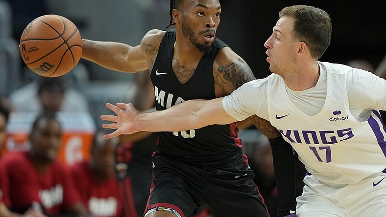 Jul 3, 2022; San Francisco, CA, USA; Miami Heat guard Javonte Smart (15) handles the ball against Sacramento Kings guard Frankie Ferrari (17) during the first quarter at the California Summer League at Chase Center. Mandatory Credit: Darren Yamashita-USA TODAY Sports