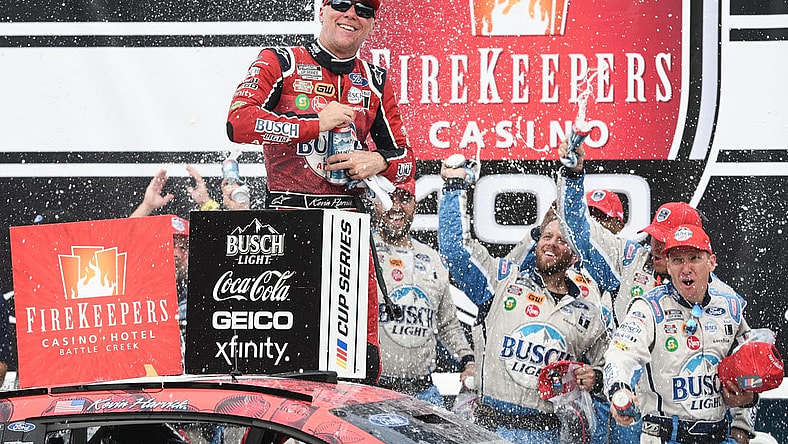 Aug 7, 2022; Brooklyn, Michigan, USA; NASCAR Cup Series driver Kevin Harvick (4) celebrates after winning at Michigan International Speedway. Mandatory Credit: Tim Fuller-USA TODAY Sports
