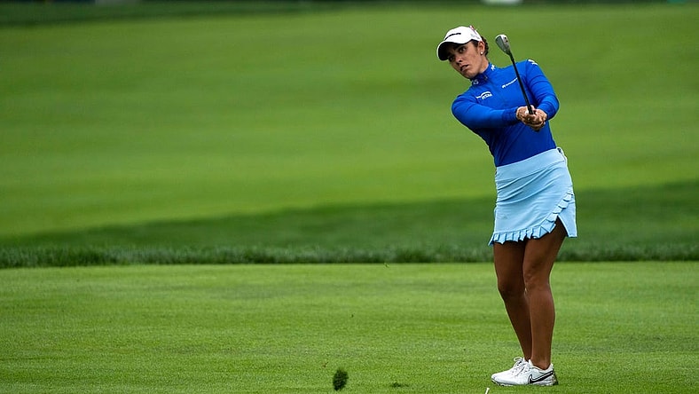 Ally Ewing watches her approach shot on hole two of the Kendale Course during the final round of the Kroger Queen City Championship presented by P&G at the Kenwood Country Club in Madeira on Sunday, Sept. 11, 2022.

Lpga Queen City Championship 0170
