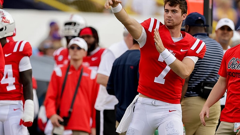 Oct 22, 2022; Baton Rouge, Louisiana, USA;  Mississippi Rebels quarterback Luke Altmyer (7) warms up on a time out again the LSU Tigers during the first half at Tiger Stadium. Mandatory Credit: Stephen Lew-USA TODAY Sports