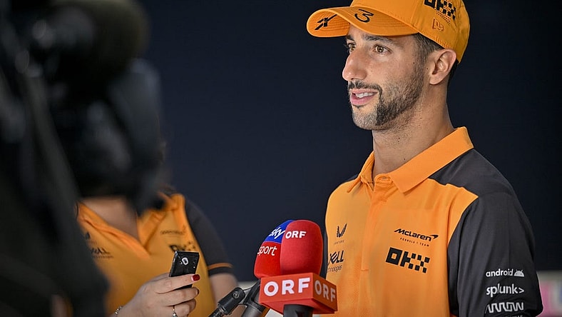 Oct 22, 2022; Austin, Texas, USA; McLaren F1 Team driver Daniel Ricciardo (3) of Team Australia is interviewed after the qualifying session for the U.S. Grand Prix at Circuit of the Americas. Mandatory Credit: Jerome Miron-USA TODAY Sports