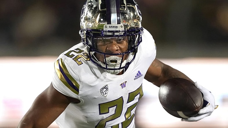 Oct 22, 2022; Berkeley, California, USA; Washington Huskies running back Cameron Davis (22) carries the ball against the California Golden Bears during the third quarter at FTX Field at California Memorial Stadium. Mandatory Credit: Darren Yamashita-USA TODAY Sports