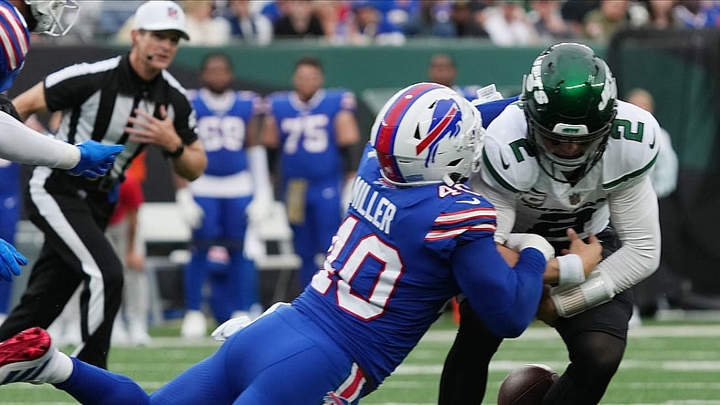 Von Miller of the Buffalo Bills knocks the ball loose from quarterback, Zach Wilson of the Jets looks in the second half during a NY Jets 20-17 win over the Buffalo Bills as the two teams met in an AFC East game played at MetLife Stadium in East Rutherford, NJ on November 6 2022.

The New York Jets Host The Buffalo Bills In An Afc East Game Played At Metlife Stadium In East Rutherford Nj On November 6 2022