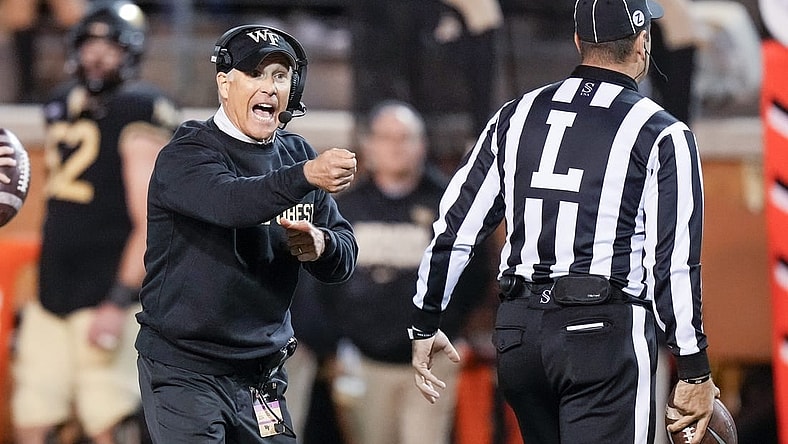 Nov 12, 2022; Winston-Salem, North Carolina, USA;  Wake Forest Demon Deacons head coach Dave Clawson calls out to an official during the second half against the North Carolina Tar Heels at Truist Field. Mandatory Credit: Jim Dedmon-USA TODAY Sports