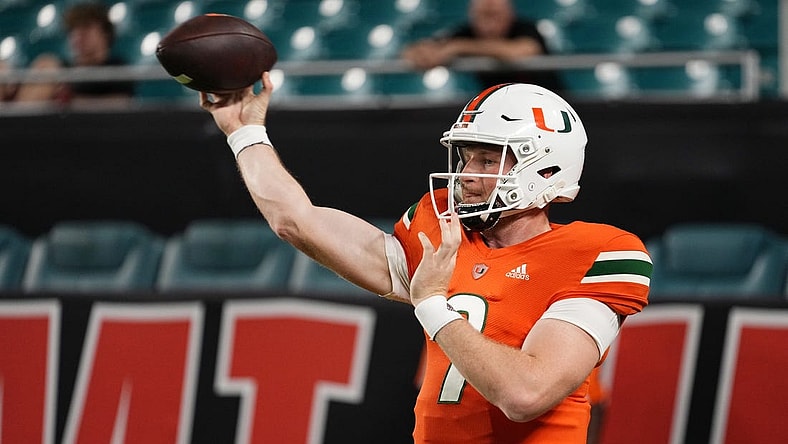 Nov 26, 2022; Miami Gardens, Florida, USA; Miami Hurricanes quarterback Tyler Van Dyke (9) warms up prior to the game against the Pittsburgh Panthers at Hard Rock Stadium. Mandatory Credit: Jasen Vinlove-USA TODAY Sports