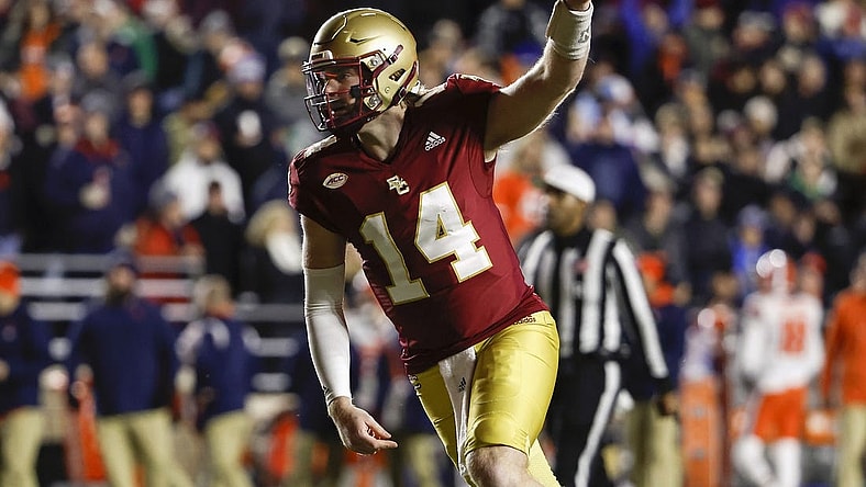 Nov 26, 2022; Chestnut Hill, Massachusetts, USA; Boston College Eagles quarterback Emmett Morehead (14) celebrates a touchdown against the Syracuse Orange during the first quarter at Alumni Stadium. Mandatory Credit: Winslow Townson-USA TODAY Sports