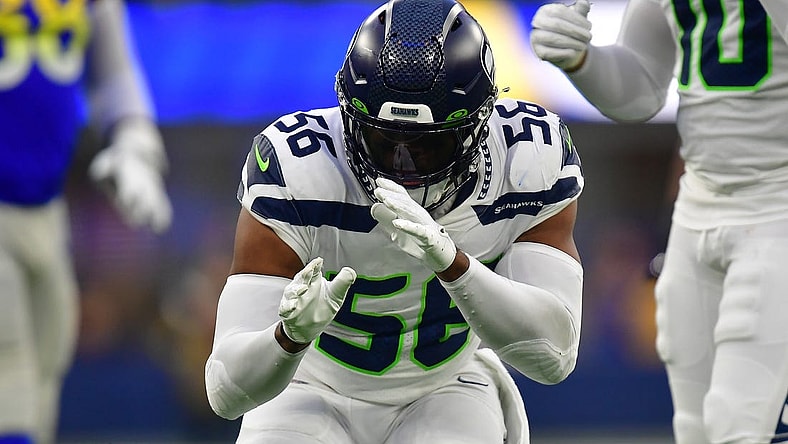 Dec 4, 2022; Inglewood, California, USA; Seattle Seahawks linebacker Jordyn Brooks (56) reacts after sacking Los Angeles Rams quarterback John Wolford (13) during the second half at SoFi Stadium. Mandatory Credit: Gary A. Vasquez-USA TODAY Sports