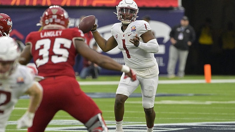 Dec 17, 2022; Inglewood, CA, USA;   Washington State Cougars quarterback Cameron Ward (1) rolls out to throw a pass against the Fresno State Bulldogs in the second half at SoFi Stadium. Mandatory Credit: Jayne Kamin-Oncea-USA TODAY Sports