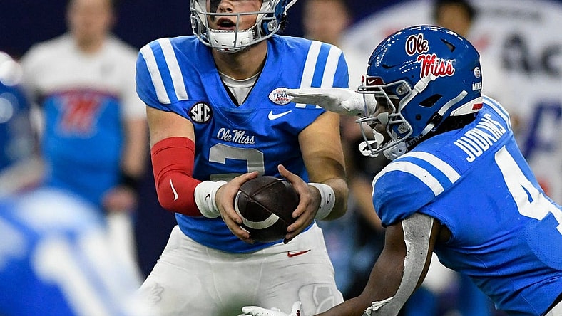 Mississippi's quarterback Jaxson Dart (2), left, prepares to hand off the ball to Mississippi's running back Quinshon Judkins (4) in the Texas Bowl game against Texas Tech, Wednesday, Dec. 28, 2022, at NRG Stadium in Houston.

Syndication Lubbock Avalanche Journal