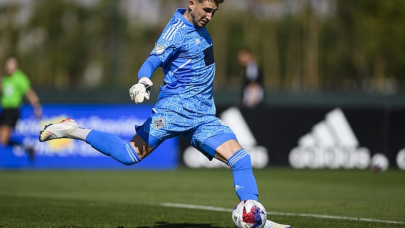 Feb 12, 2023; Indio, CA, USA; Vancouver Whitecaps goalkeeper Thomas Hasal (1) kicks a goal kick against St. Louis City SC at Empire Polo Club. Mandatory Credit: Kelvin Kuo-USA TODAY Sports