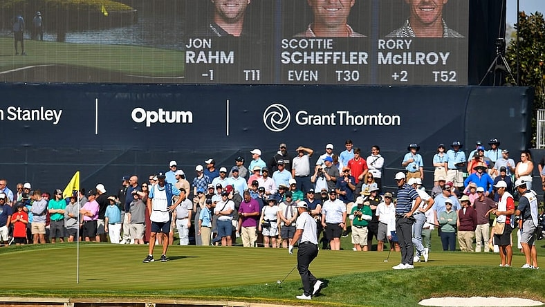 The group of Jon Rahm, Scottie Scheffler and Rory McIlroy on the green of island holes 17 during first round action of The Players Championship in Ponte Vedra Beach, FL, Thursday, March 9, 2023.

Jki 030923 Bs The Players Thursday 16
