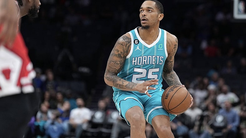 Mar 31, 2023; Charlotte, North Carolina, USA;  Charlotte Hornets forward P.J. Washington (25) looks for the basket in the first quarter against the Chicago Bulls at Spectrum Center. Mandatory Credit: David Yeazell-USA TODAY Sports