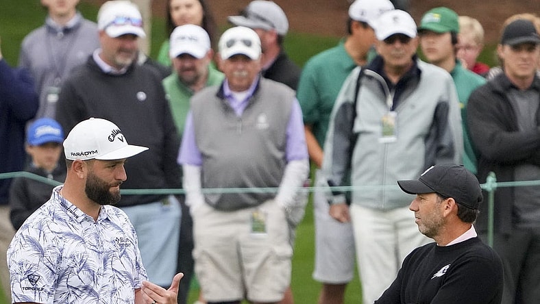 Apr 3, 2023; Augusta, Georgia, USA; Jon Rahm and Sergio Garcia talk at the practice facility during a practice round for The Masters golf tournament at Augusta National Golf Club. Mandatory Credit: Danielle Parhizkaran-USA TODAY Network

Pga The Masters Practice Round
