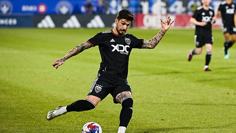 Apr 15, 2023; Montreal, Quebec, CAN;DC United forward Taxi Fountas (11) kicks the ball during the first half against D.C. United at Stade Saputo. Mandatory Credit: David Kirouac-USA TODAY Sports