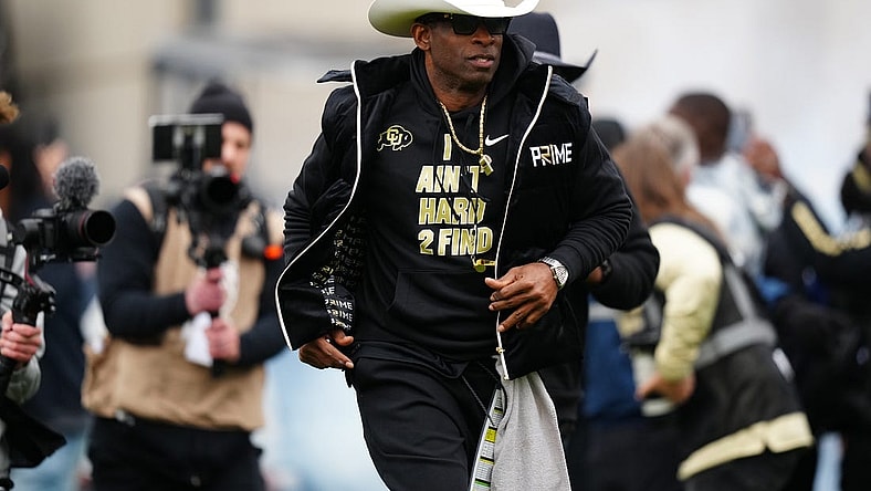 Apr 22, 2023; Boulder, CO, USA; Colorado Buffaloes head coach Deion Sanders hits the field before the start of the spring game at Folsom Filed. Mandatory Credit: Ron Chenoy-USA TODAY Sports