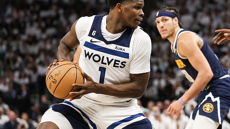 Apr 23, 2023; Minneapolis, Minnesota, USA; Minnesota Timberwolves guard Anthony Edwards (1) controls the ball against the Denver Nuggets during the fourth quarter of game four of the 2023 NBA Playoffs at Target Center. Mandatory Credit: Matt Krohn-USA TODAY Sports