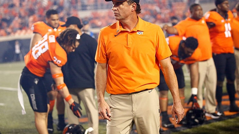 Oklahoma Sate football coach Mike Gundy waits to sing the alma mater following the college football game between Oklahoma State University Cowboys (OSU) and Baylor University Bears at Boone Pickens Stadium in Stillwater, Okla., Saturday, Oct. 2, 2021. OSU won 24-17.

gundy cover cutout