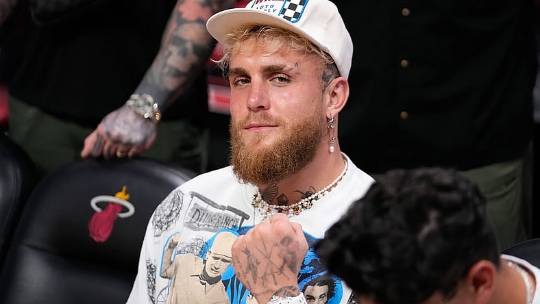 May 6, 2023; Miami, Florida, USA; Jake Paul watches a game between the Miami Heat and the New York Knicks during game three of the 2023 NBA playoffs at Kaseya Center. Mandatory Credit: Rich Storry-USA TODAY Sports