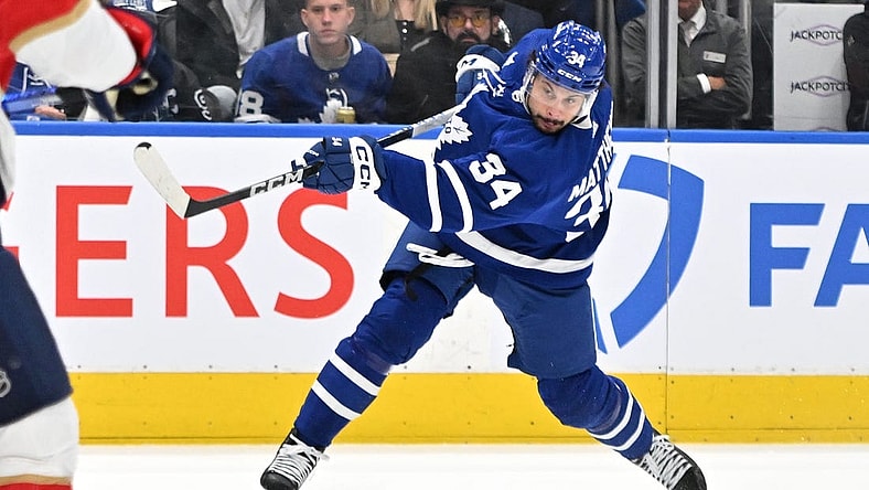 May 12, 2023; Toronto, Ontario, CAN;  Toronto Maple Leafs forward Auston Matthews (34) shoots the puck against the Florida Panthers in the first period in game five of the second round of the 2023 Stanley Cup Playoffs at Scotiabank Arena. Mandatory Credit: Dan Hamilton-USA TODAY Sports