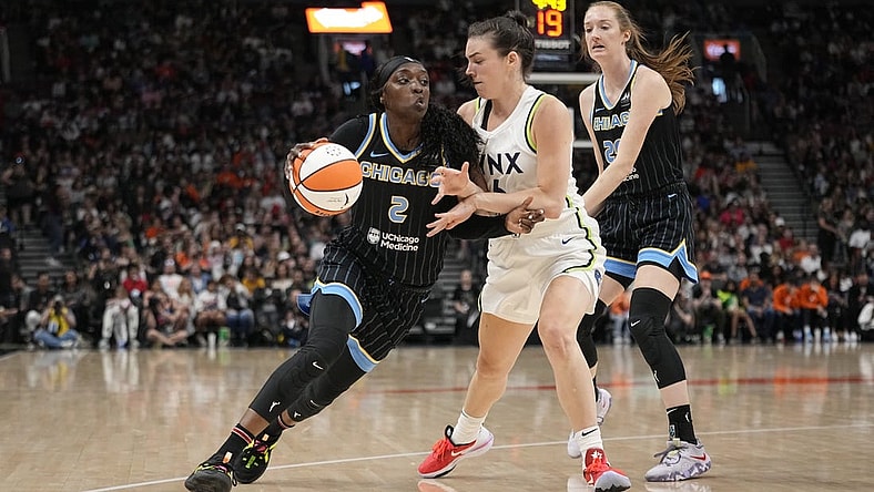 May 13, 2023; Toronto, Ontario, Canada; Chicago Sky guard Kahleah Copper (2) drives to the net against Minnesota Lynx forward Bridget Carleton (6) during the first half at Scotiabank Arena. Mandatory Credit: John E. Sokolowski-USA TODAY Sports