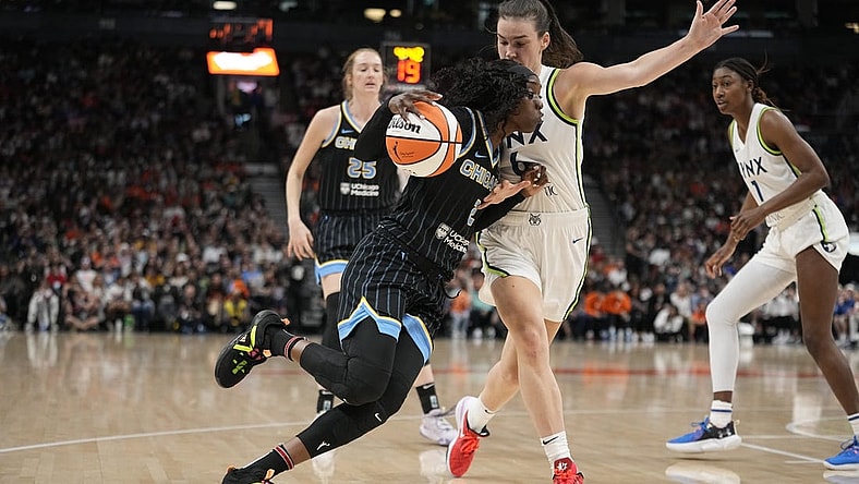 May 13, 2023; Toronto, Ontario, Canada; Chicago Sky guard Kahleah Copper (2) drives to the net against Minnesota Lynx forward Bridget Carleton (6) during the first half at Scotiabank Arena. Mandatory Credit: John E. Sokolowski-USA TODAY Sports