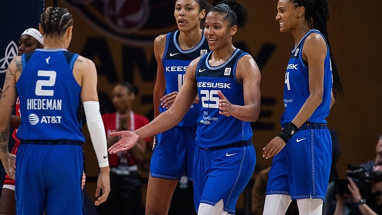 May 19, 2023; Indianapolis, Indiana, USA; Connecticut Sun forward Alyssa Thomas (25) celebrates a and one with teammates in the second half against the Indiana Fever at Gainbridge Fieldhouse. Mandatory Credit: Trevor Ruszkowski-USA TODAY Sports