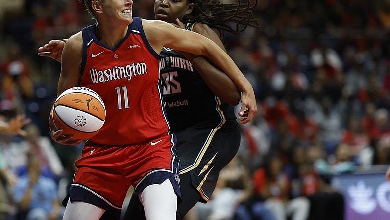 May 19, 2023; Washington, District of Columbia, USA; Washington Mystics forward Elena Delle Donne (11) drives to the basket as New York Liberty forward Jonquel Jones (35) defends in the third quarter at Entertainment & Sports Arena. Mandatory Credit: Geoff Burke-USA TODAY Sports