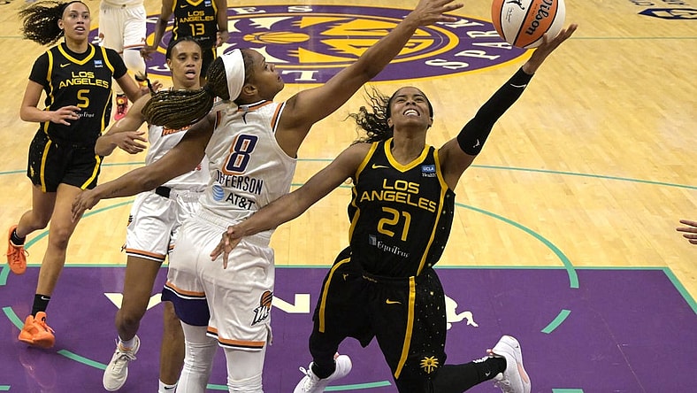May 19, 2023; Los Angeles, California, USA; Phoenix Mercury guard Moriah Jefferson (8) blocks a shot by Los Angeles Sparks guard Jordin Canada (21) in the first half at Crypto.com Arena. Mandatory Credit: Jayne Kamin-Oncea-USA TODAY Sports