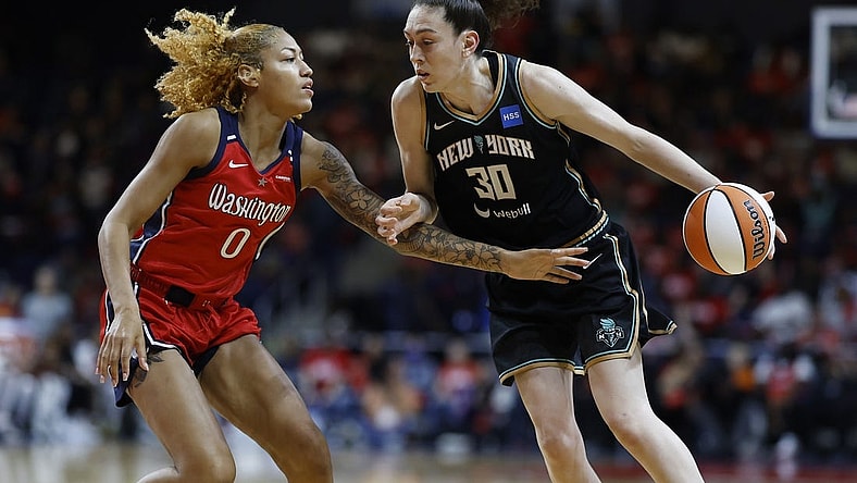 May 19, 2023; Washington, District of Columbia, USA; New York Liberty forward Breanna Stewart (30) drives to the basket as Washington Mystics center Shakira Austin (0) defends at Entertainment & Sports Arena. Mandatory Credit: Geoff Burke-USA TODAY Sports