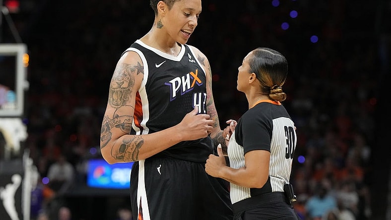 May 21, 2023; Phoenix, Arizona, USA; Phoenix Mercury center Brittney Griner (42) talks to WNBA official Sha'Rae Mitchell in the second half against the Chicago Sky at Footprint Center. Mandatory Credit: Rick Scuteri-USA TODAY Sports