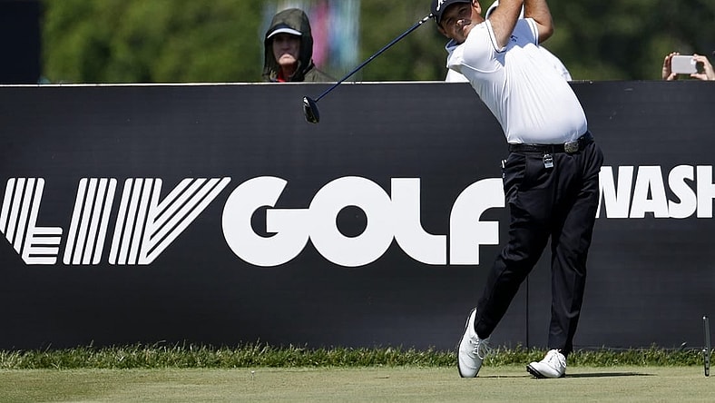 May 25, 2023; Washington, DC, USA; Patrick Reed hits his tee shot on the ninth hole during the Pro-Am tournament as part of the LIV Golf Washington D.C. 2023 event at Trump National Golf Club outside Washington DC. Mandatory Credit: Geoff Burke-USA TODAY Sports