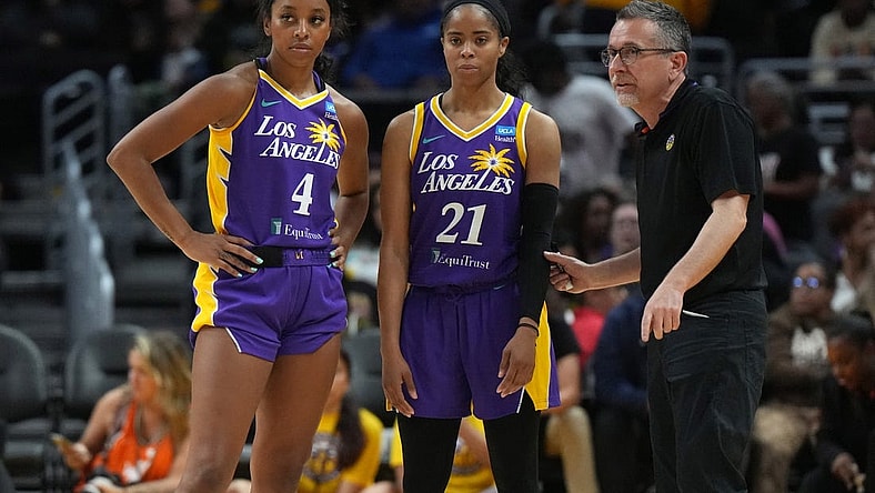May 25, 2023; Los Angeles, California, USA; LA Sparks guard Lexie Brown (4), guard Jordin Canada (21) and coach Curt Miller react during the second half against the Las Vegas Aces at Crypto.com Arena. Mandatory Credit: Kirby Lee-USA TODAY Sports