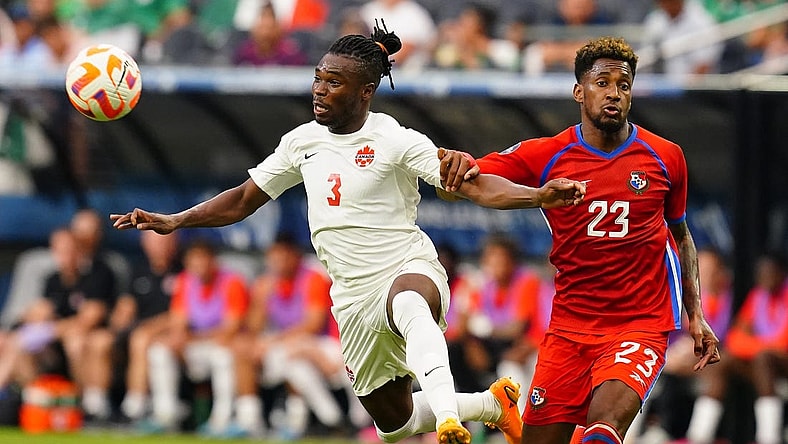 Jun 15, 2023; Las Vegas, Nevada, USA; Panama defender Michael Murillo (23) grabs Canada defender Samuel Adekugbe (3) during the first half at Allegiant Stadium. Mandatory Credit: Lucas Peltier-USA TODAY Sports