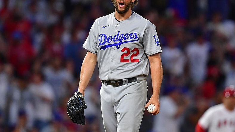 Jun 20, 2023; Anaheim, California, USA; Los Angeles Dodgers starting pitcher Clayton Kershaw (22) reacts after the home plate video review on Los Angeles Angels right fielder Hunter Renfroe (12) is overturned in the fourth inning at Angel Stadium. Mandatory Credit: Gary A. Vasquez-USA TODAY Sports