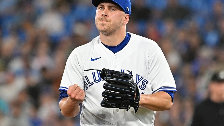Jun 23, 2023; Toronto, Ontario, CAN;  Toronto Blue Jays relief pitcher Erik Swanson (50) reacts after the final out of the eighth inning against the Oakland Athletics at Rogers Centre. Mandatory Credit: Dan Hamilton-USA TODAY Sports