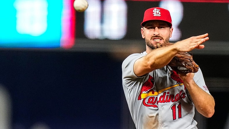 Jul 6, 2023; Miami, Florida, USA; St. Louis Cardinals shortstop Paul DeJong (11) throws the ball to first base against the Miami Marlins during the eighth inning at loanDepot Park. Mandatory Credit: Rich Storry-USA TODAY Sports