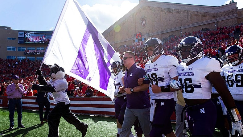 Northwestern head coach Pat Fitzgerald leads him team onto the field after the national anthem before their game against Wisconsin Saturday, September 30, 2017 at Camp Randall Stadium in Madison, Wis. Wisconsin beat Northwestern 33-24.MARK HOFFMAN/MILWAUKEE JOURNAL SENTINEL (Via OlyDrop)