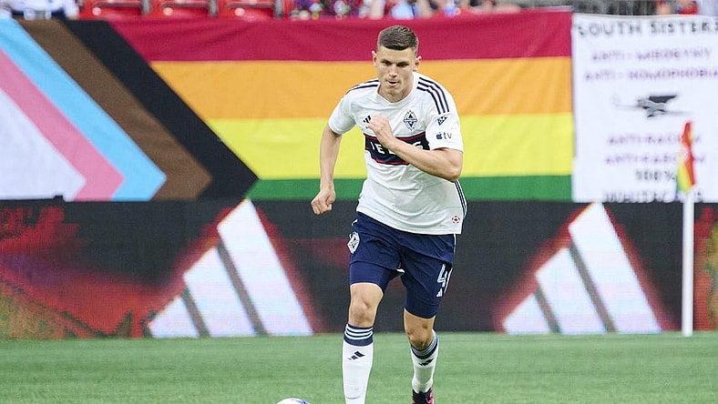 Jul 8, 2023; Vancouver, British Columbia, CAN; Vancouver Whitecaps defender Ranko Veselinovic (4) controls a pass during the first half against the Seattle Sounders at BC Place. Mandatory Credit: Troy Wayrynen-USA TODAY Sports