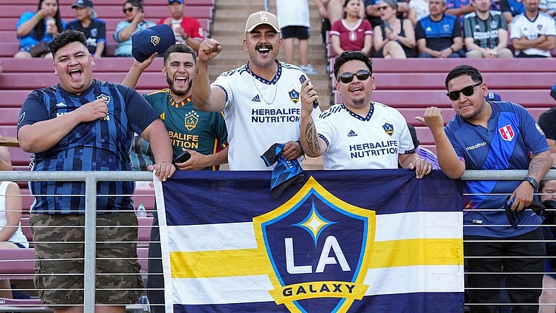 Jul 1, 2023; Stanford, California, USA; Los Angeles Galaxy fans cheer before the game against the San Jose Earthquakes at Stanford Stadium. Mandatory Credit: Darren Yamashita-USA TODAY Sports