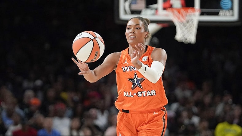 Jul 15, 2023; Las Vegas, NV, USA; Team Stewart frontcourt Napheesa Collier (24) passes the ball against Team Wilson during the first half in the 2023 WNBA All-Star Game at Michelob Ultra Arena. Mandatory Credit: Lucas Peltier-USA TODAY Sports