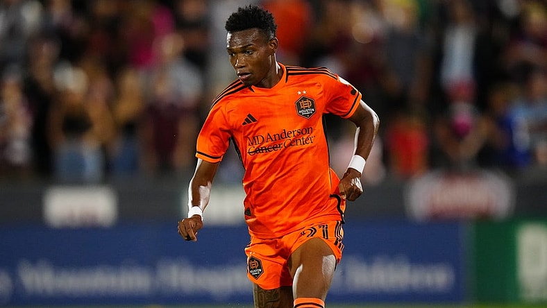 Jul 15, 2023; Commerce City, Colorado, USA; Houston Dynamo FC forward Nelson Quinones (21) in action during the second half against the Colorado Rapids at Dick's Sporting Goods Park. Mandatory Credit: Ron Chenoy-USA TODAY Sports