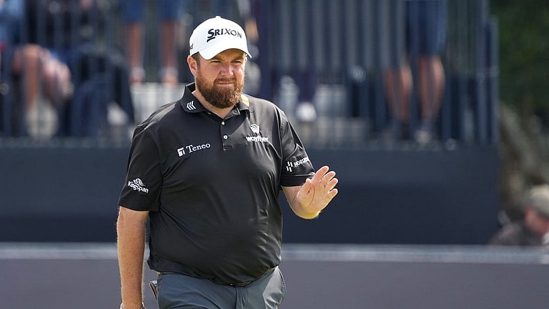 July 20, 2023; Hoylake, ENGLAND, GBR; Shane Lowry acknowledges the crowd on the seventh green during the first round of The Open Championship golf tournament at Royal Liverpool. Mandatory Credit: Kyle Terada-USA TODAY Sports