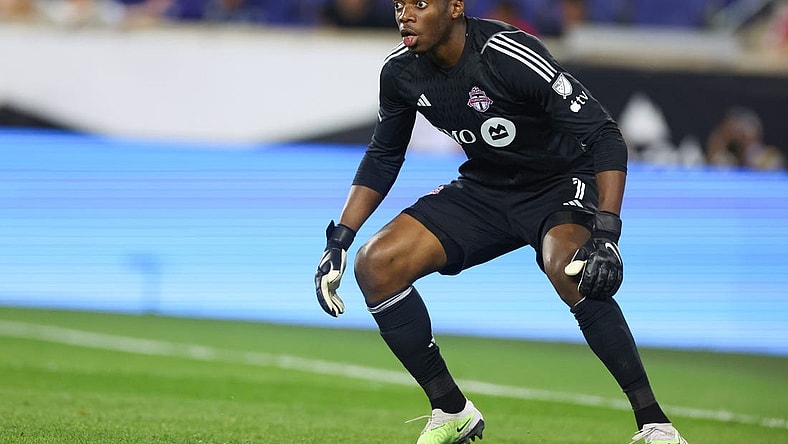 Jul 26, 2023; Harrison, NJ, USA; Toronto FC goalkeeper Sean Johnson (1) sets for a shot during the second half against New York City FC at Red Bull Arena. Mandatory Credit: Vincent Carchietta-USA TODAY Sports